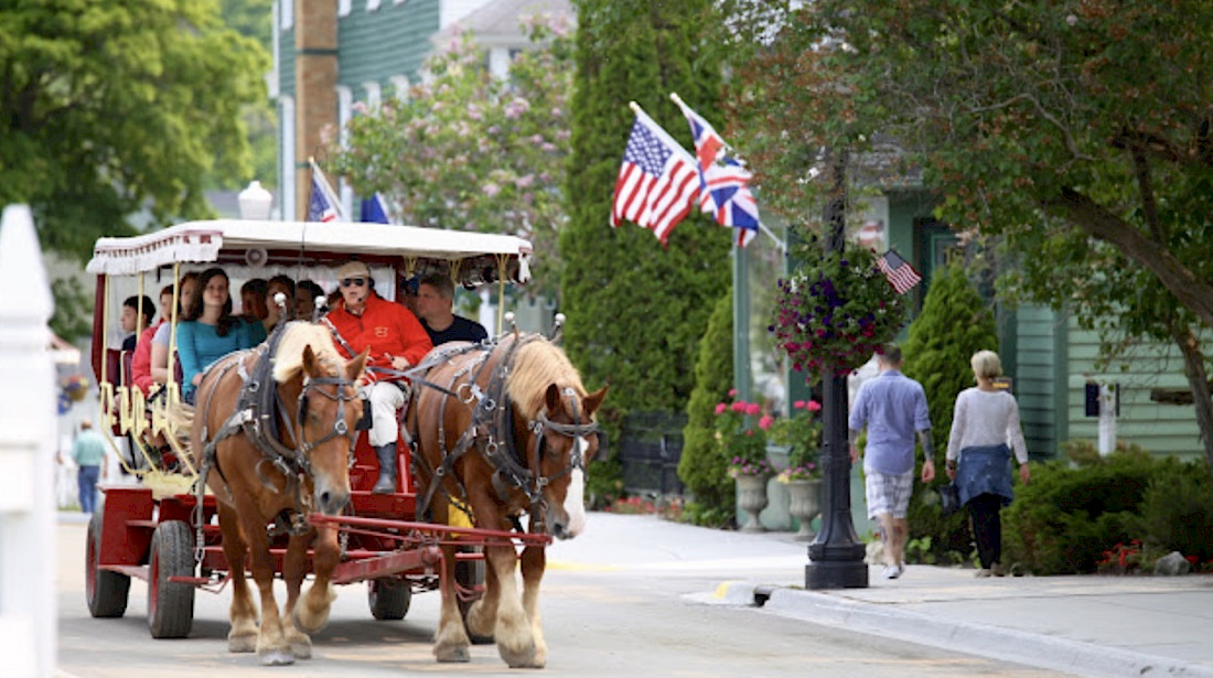 Take a horse and carriage ride in Mackinac Island.