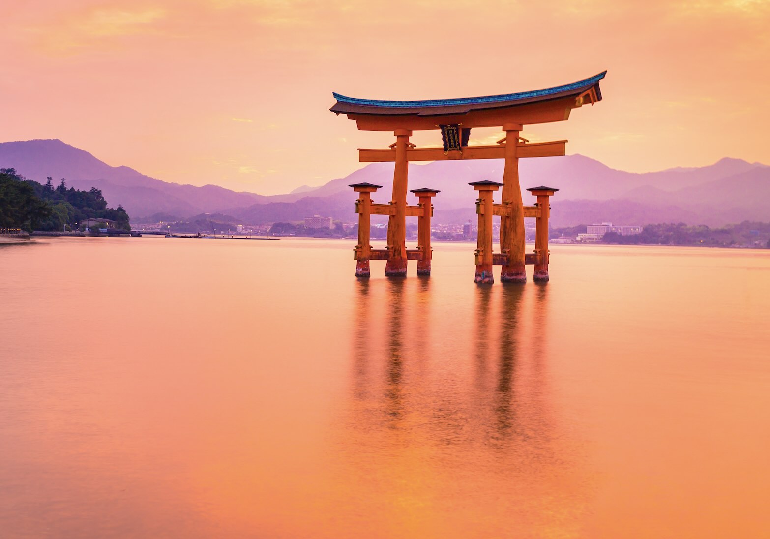 The Torii Gate at sunset in Miyajima, Japan.