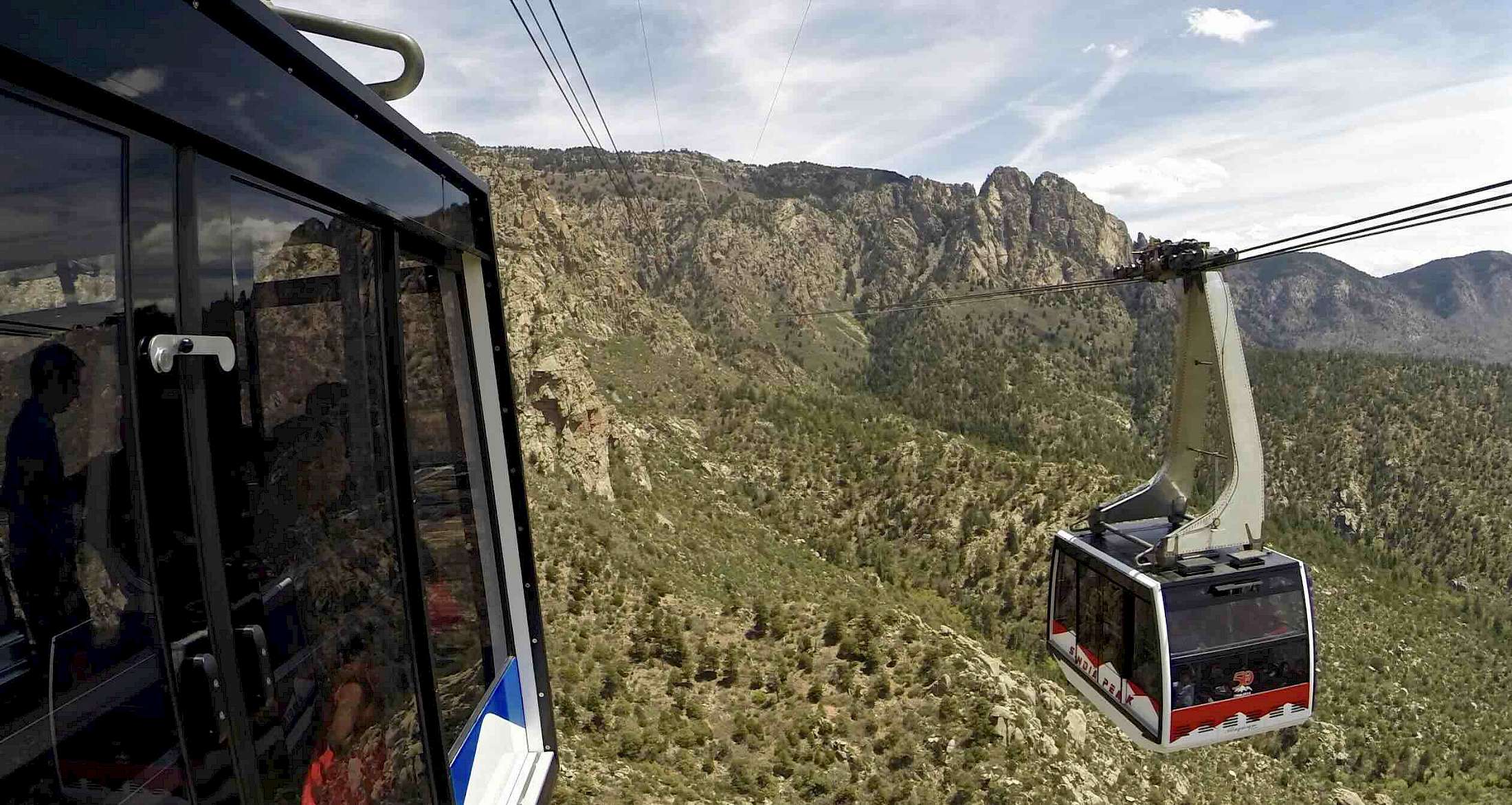 The Sandia Peak Tramway takes visitors on a 2.7-mile ascent to the 10,378-foot summit of the Sandia Mountains.