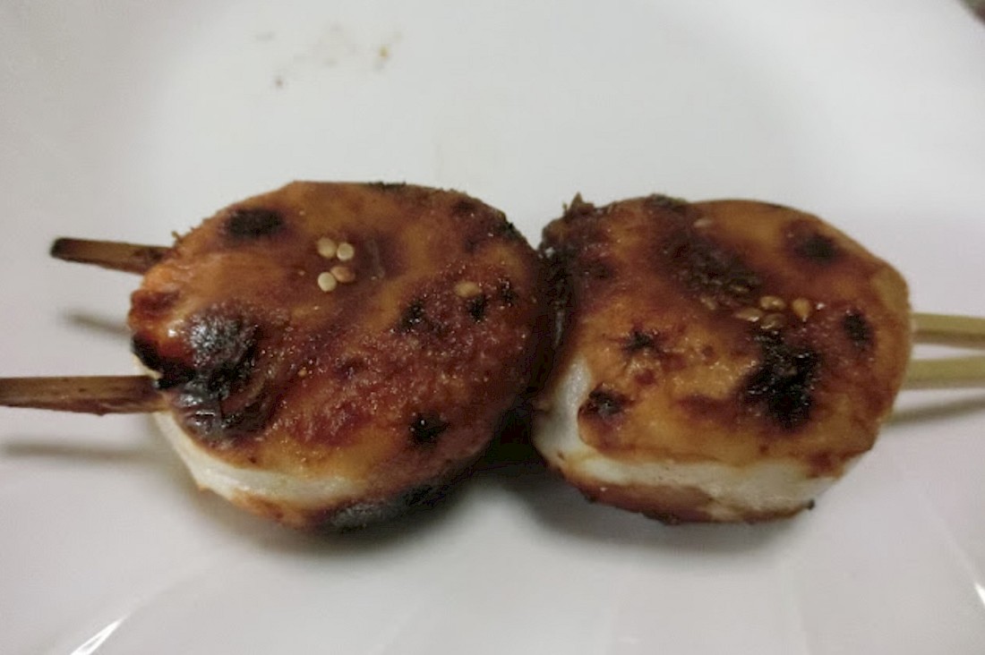 Skewers of soy glazed treats.