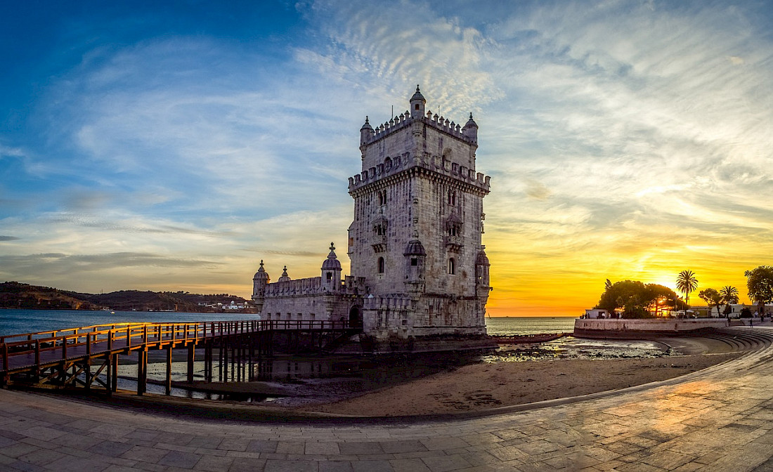 Watch the sunset at Belem Tower.